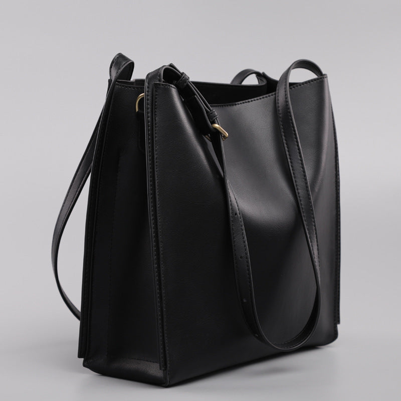 SAC SEAU CUIR COMMUTER