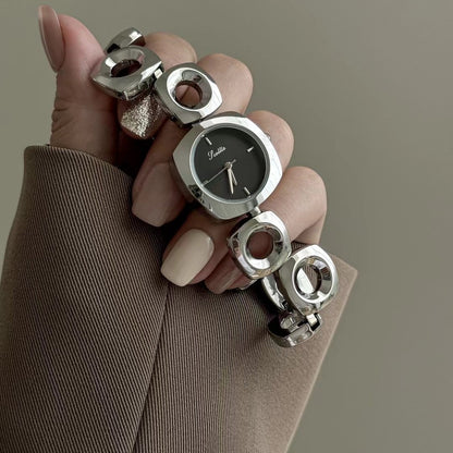 MONTRE SCULPTÉE DORÉE FEMME