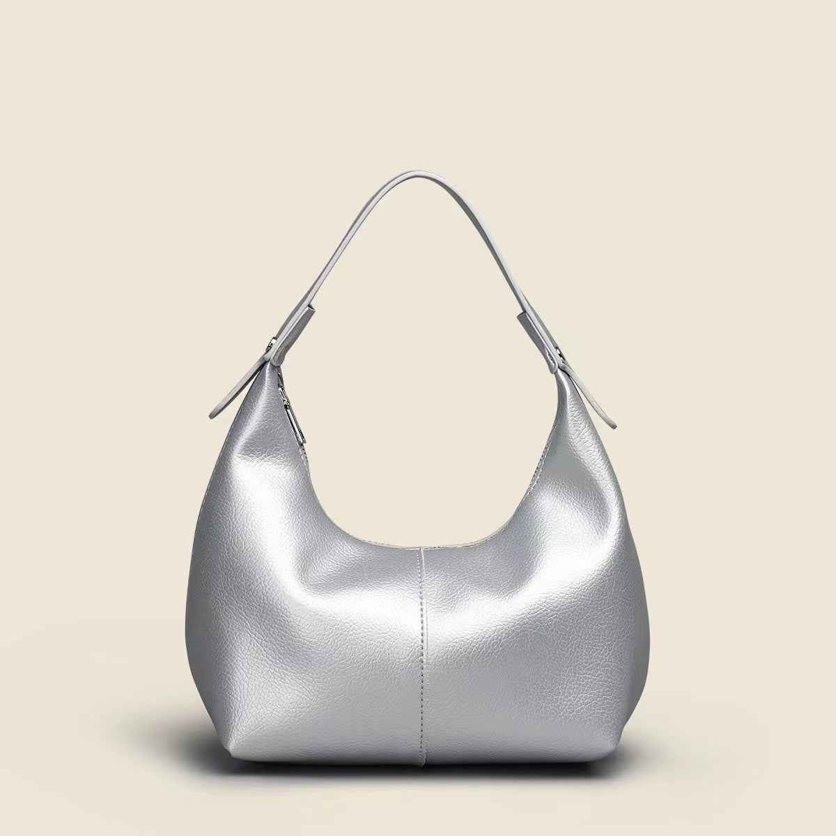 sac à épaule noir au design minimaliste en forme de croissant de lune