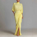 Robe longue uni drapée fendue col montant manches chauve-souris
